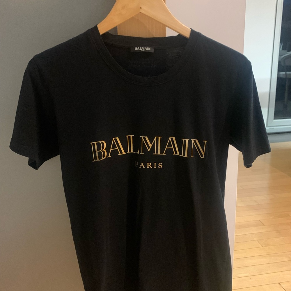 Balmain Black Tee with Gold Lettering
Asking $140 or best offer